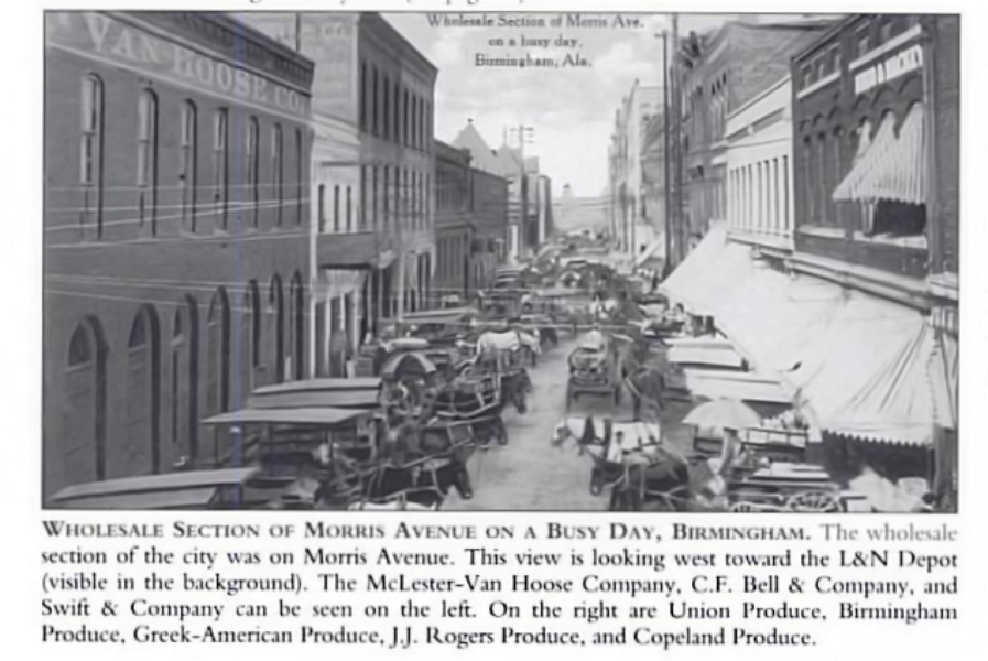 Photo of old newspaper clipping showing case the wholesale section of Morris Avenue on a busy day with horses and carts present.